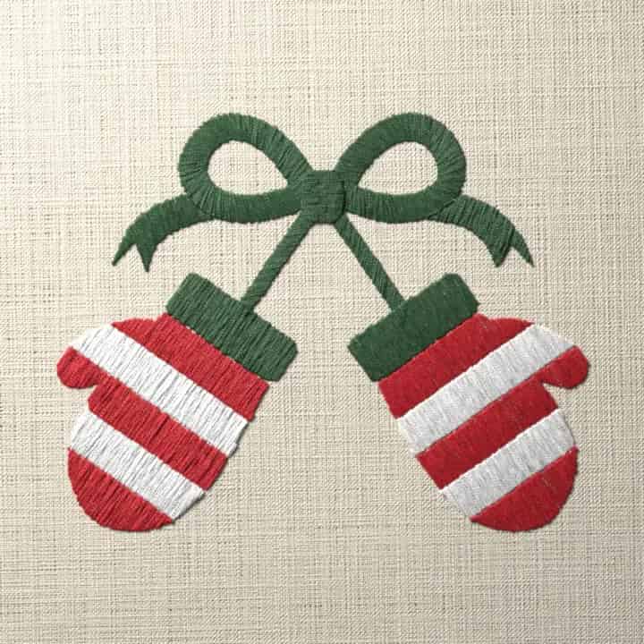 Striped mittens on a bow: preview of the stitched design