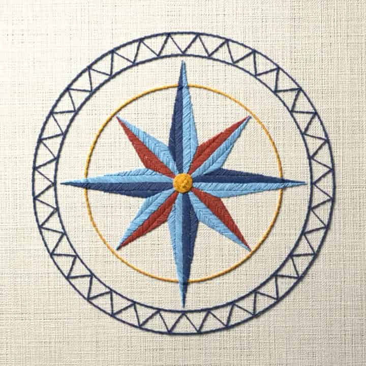 Compass rose with a sawtooth border: preview of the stitched design