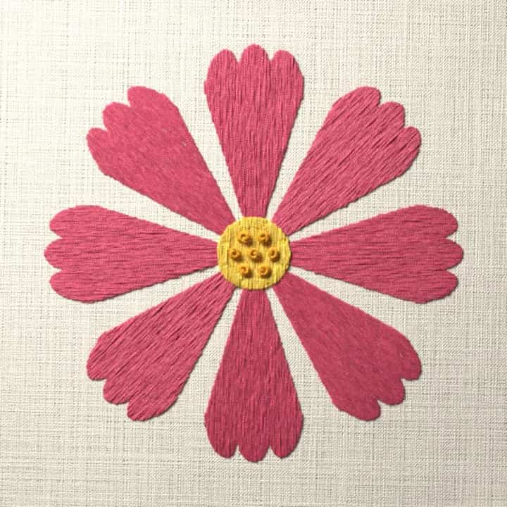 Pink cosmos bloom: preview of the stitched design