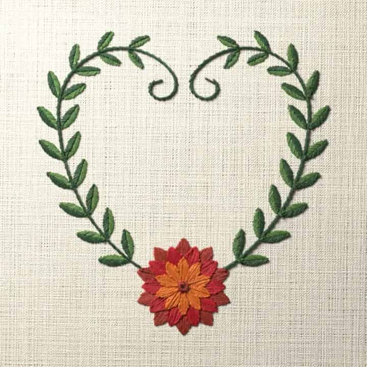 Dahlia vine heart: preview of the stitched design
