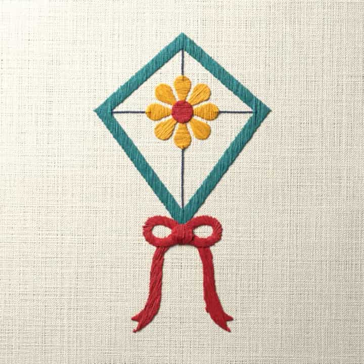 Daisy kite with a bow: preview of the stitched design