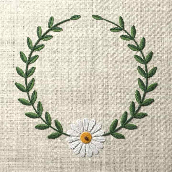 Daisy laurel wreath: preview of the stitched design