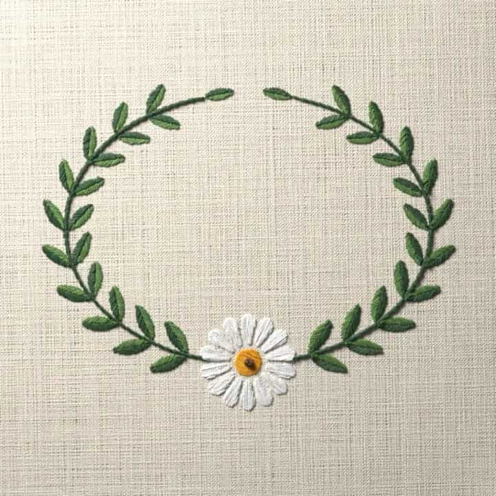 Daisy oval frame: preview of the stitched design