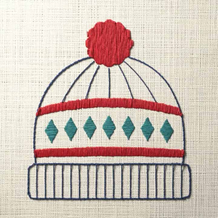 Bobble hat with a diamond band: preview of the stitched design