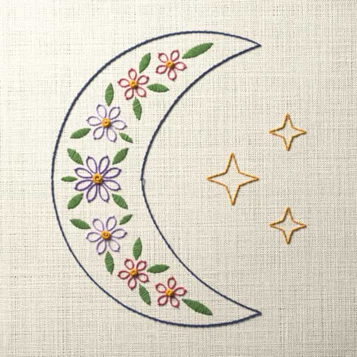 Flower filled crescent moon: preview of the stitched design