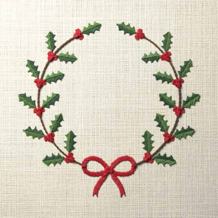 Holly bow wreath: preview of the stitched design