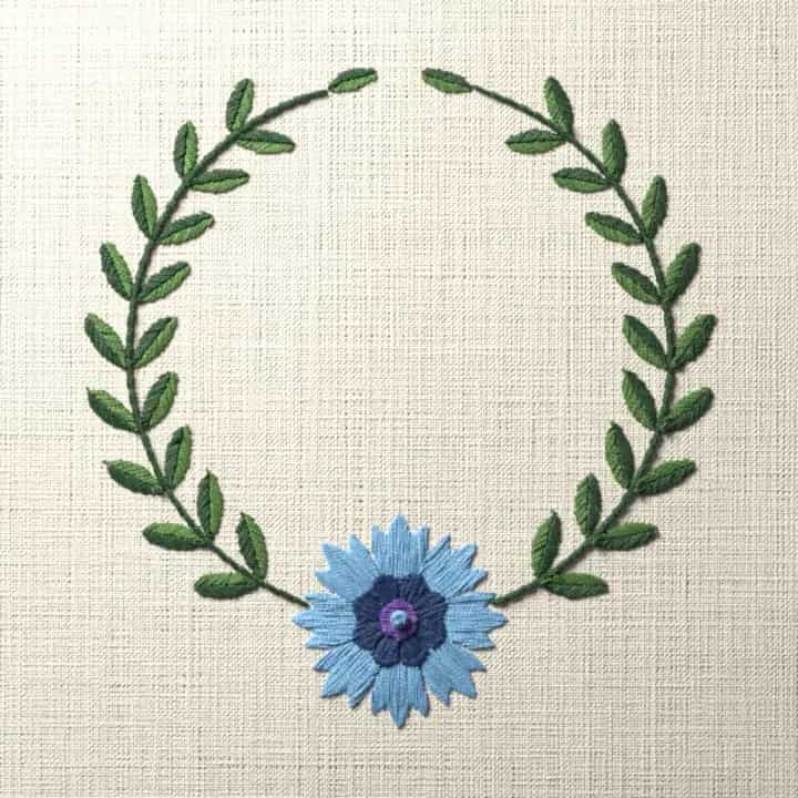 Cornflower laurel wreath: preview of the stitched design