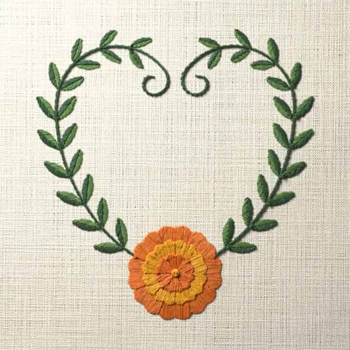 Marigold vine heart: preview of the stitched design