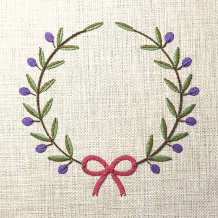 Olive bow wreath: preview of the stitched design