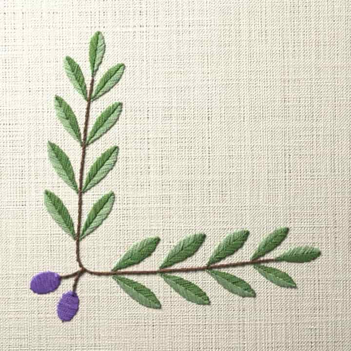 Olive branch corner: preview of the stitched design