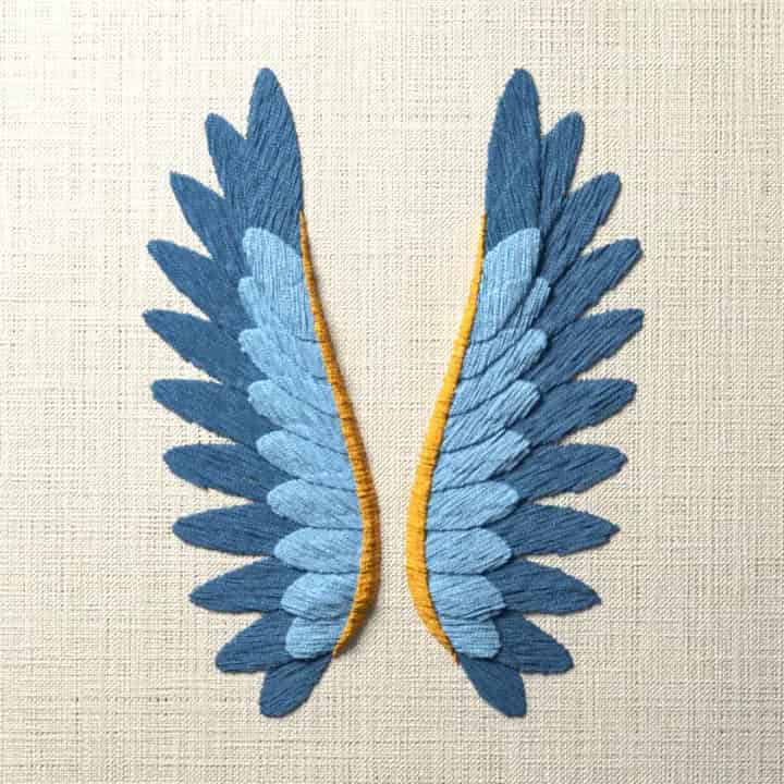 Pair of raised wings: preview of the stitched design