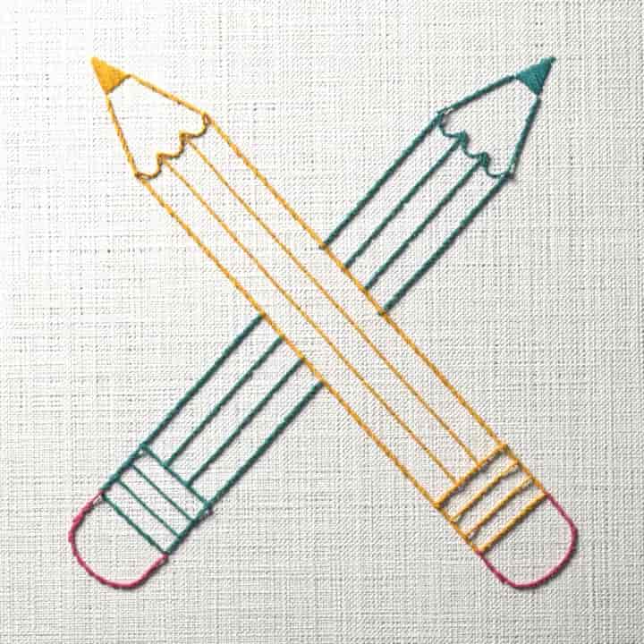Crossed pencils: preview of the stitched design