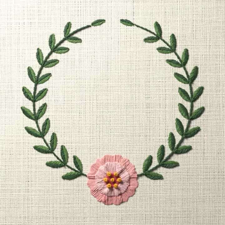 Peony laurel wreath: preview of the stitched design