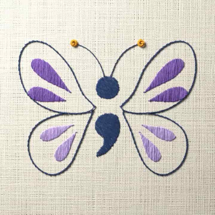 Semicolon with butterfly wings: preview of the stitched design