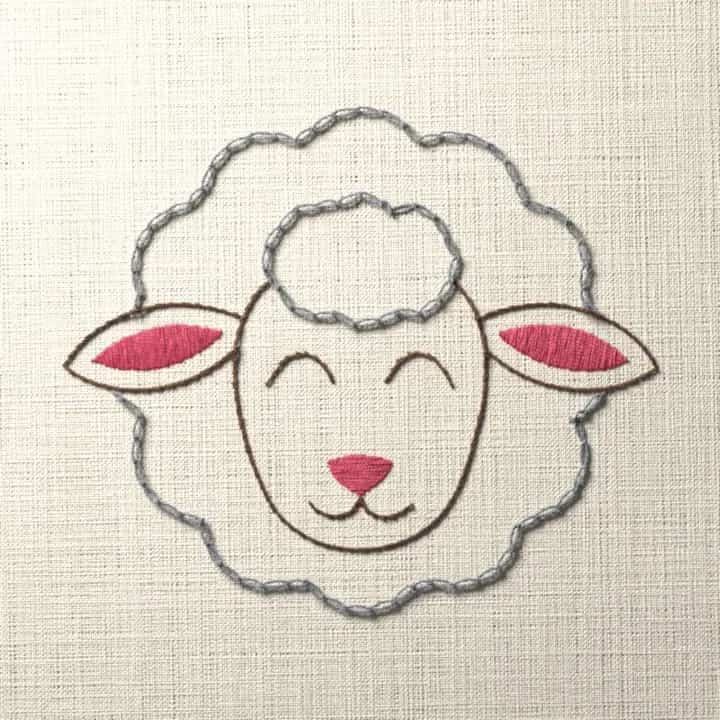 Sheep face in a scalloped fleece: preview of the stitched design