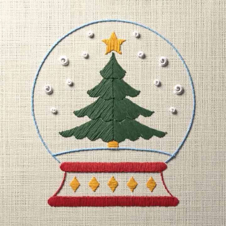Snow globe with a fir tree: preview of the stitched design