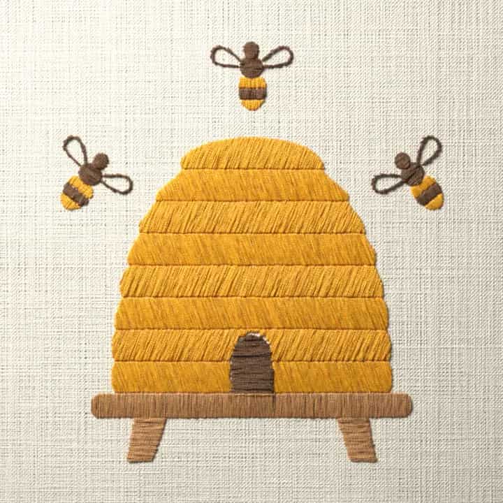 Straw bee skep with three bees: preview of the stitched design