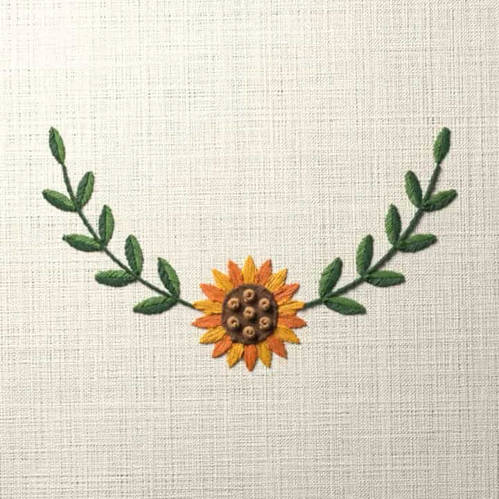 Sunflower crescent spray: preview of the stitched design