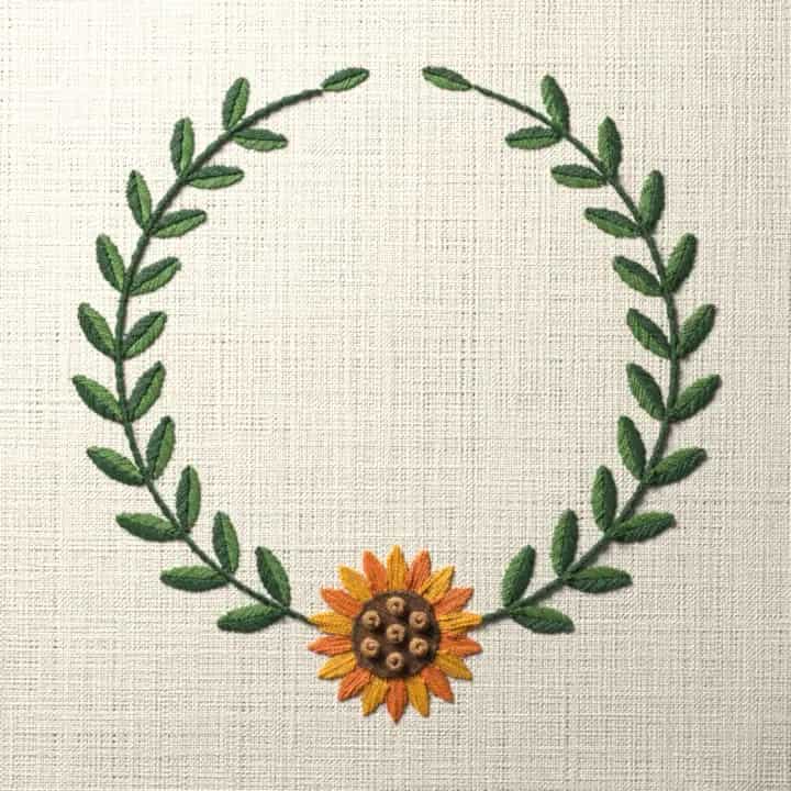 Sunflower laurel wreath: preview of the stitched design