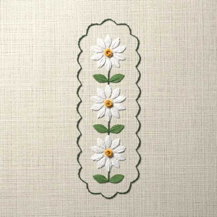 Three daisy bookmark: preview of the stitched design