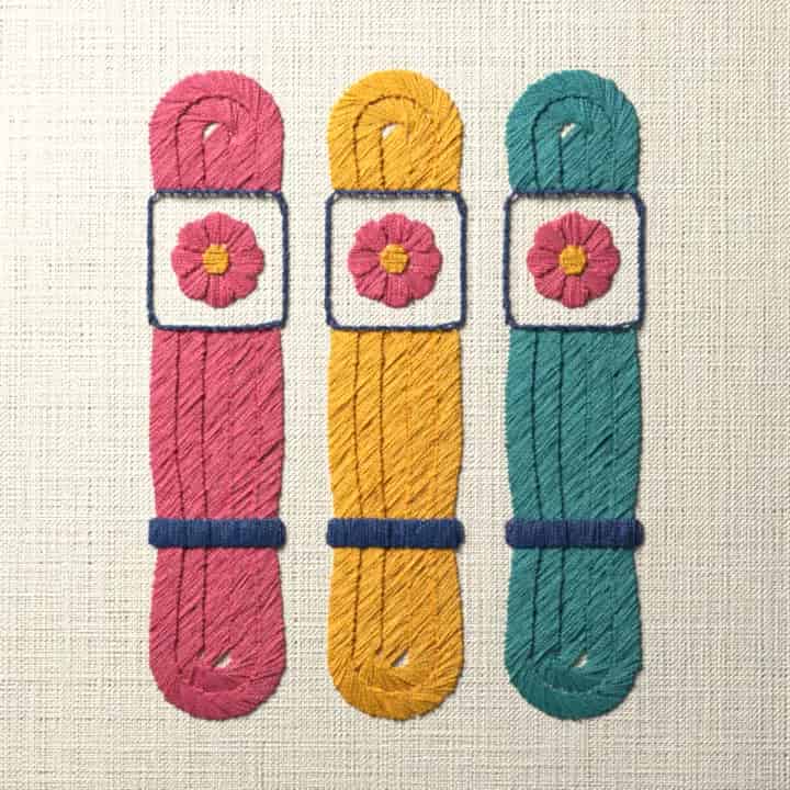 Three skeins of floss: preview of the stitched design