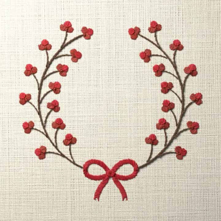 Winterberry bow wreath: preview of the stitched design