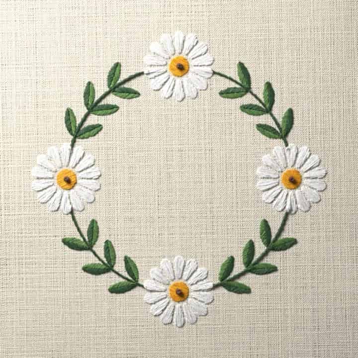 Wreath of four daisies: preview of the stitched design