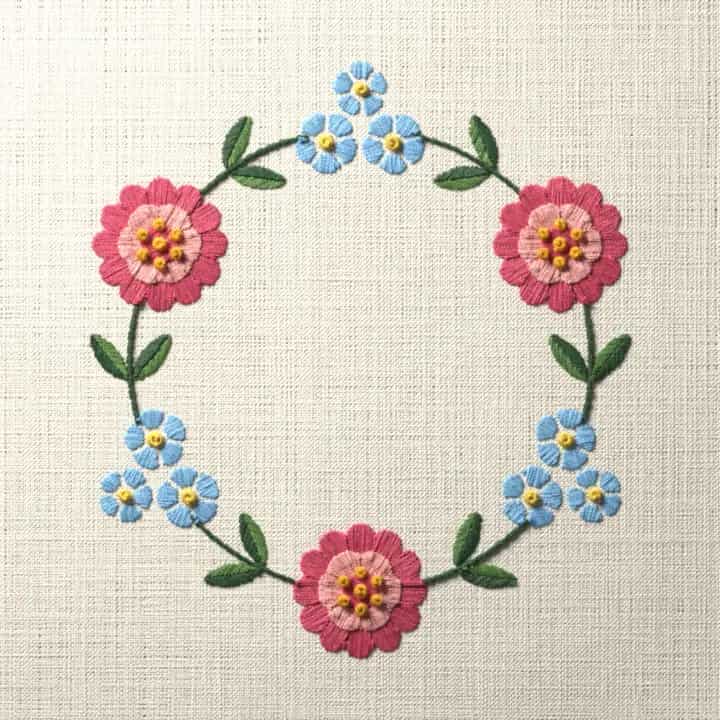 Zinnia and forget-me-not wreath: preview of the stitched design